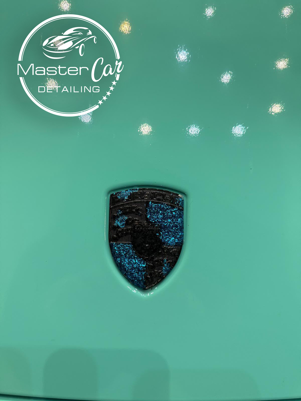 Dettaglio del colore Tiffany e dello stemma Porsche